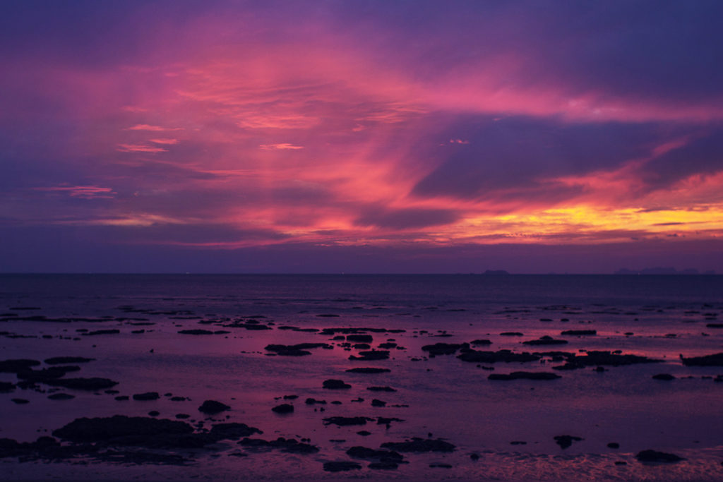 A beautiful purple sunset over the sea in Koh Lanta, Thailand.