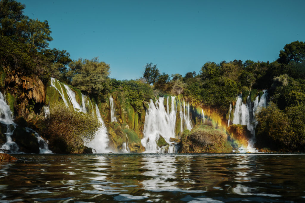 A waterfall in Bosnia with a beautiful rainbow.