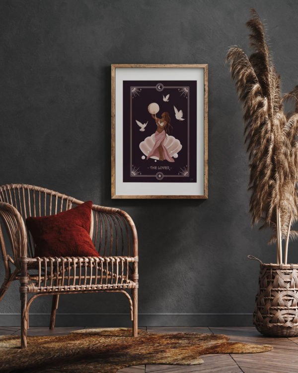 A large framed print of the Lover Archetype illustration in a beautiful dark interior.
