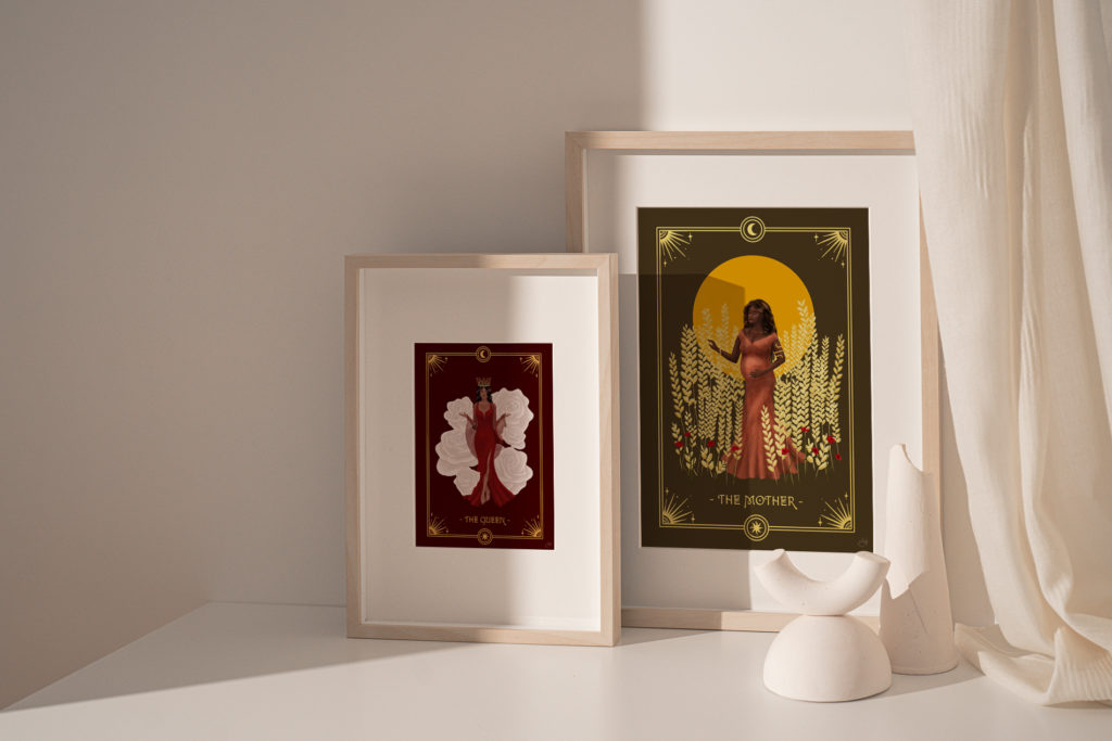 The 7 Feminine Archetypes are a tool for self-discovery. Shown in the image are framed illustration by artist Anna Heimkreiter. They depict the Mother Archetype and the Queen Archetype, two of the seven female archetypes.