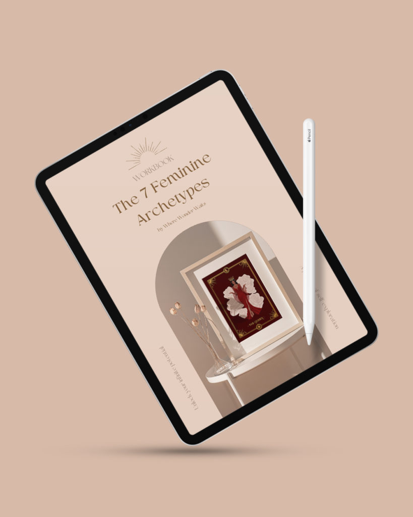 An ipad shows a preview of the 7 Feminine Archetype Workbooks. Included will be practical exercises to understand your archetype and feminine energy for more self-awareness and personal growth.